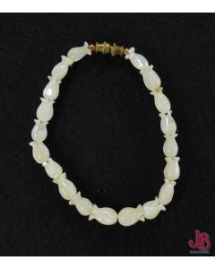 Vintage bracelet of hand carved mother of pearl beads. 