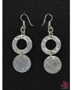 A pair of sterling silver earrings, hammered circles and disks .