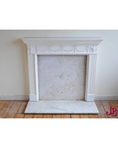 White Georgian Design Fireplace surround with mable hearth and back.