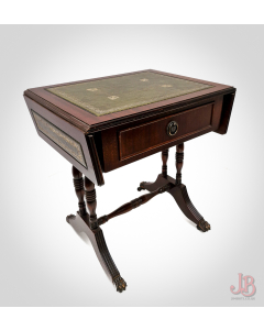 Small folding mahogany side table, green leather inlay, metal claw casters.
