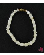Vintage bracelet of hand carved mother of pearl beads. 